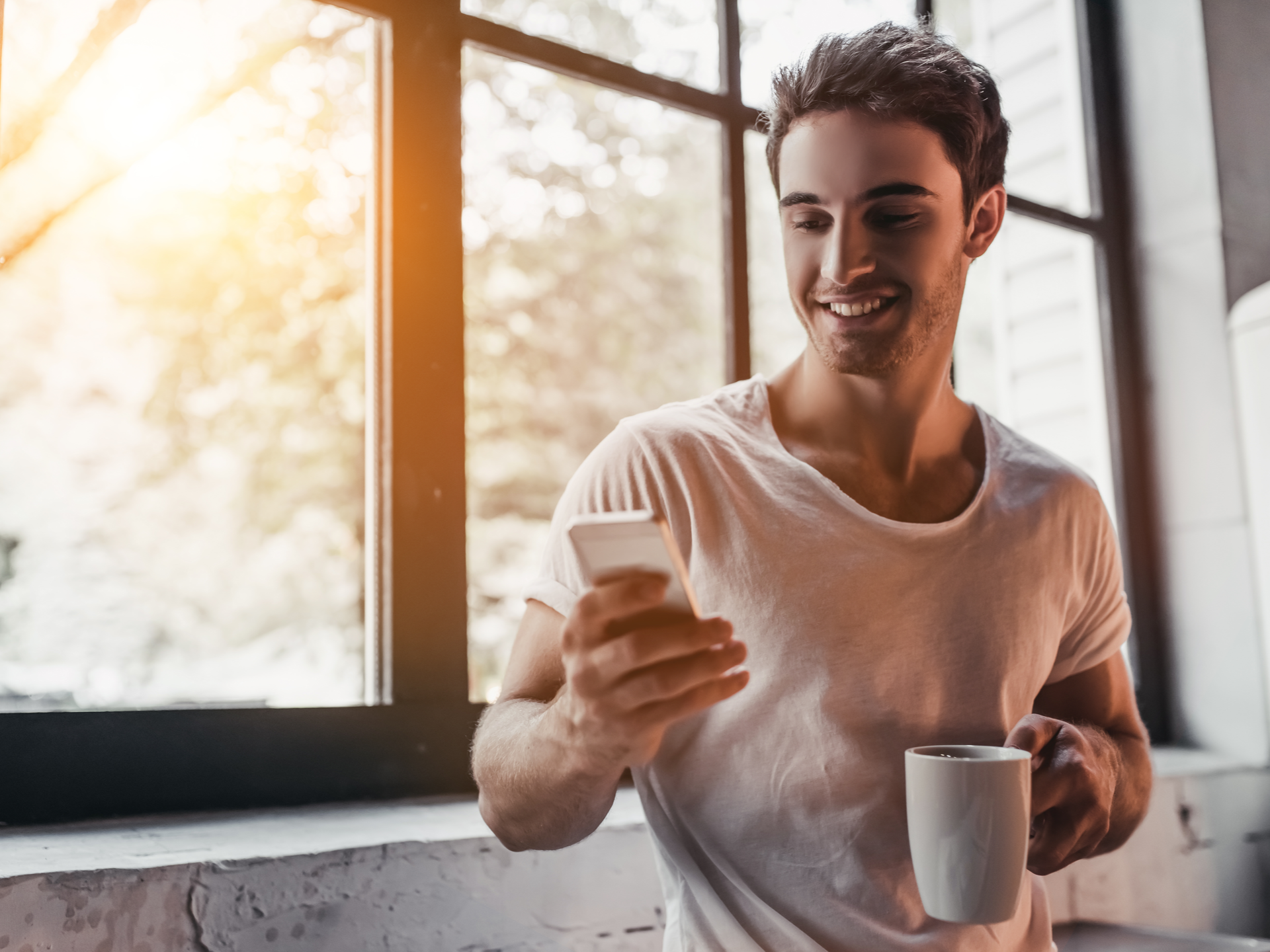 man looking at phone baseline health